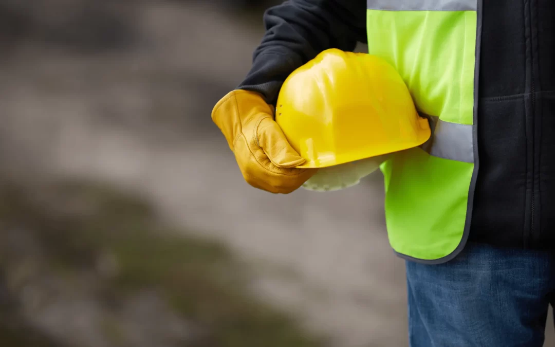 Image of man holding hard hat to introduce our new blog 'Construction Marketing Specialists'.